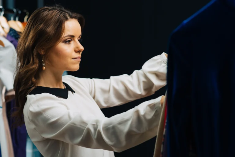 side-view-woman-choosing-clothes-shop